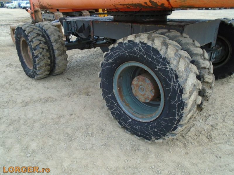 Excavator pe pneuri Atlas 1304