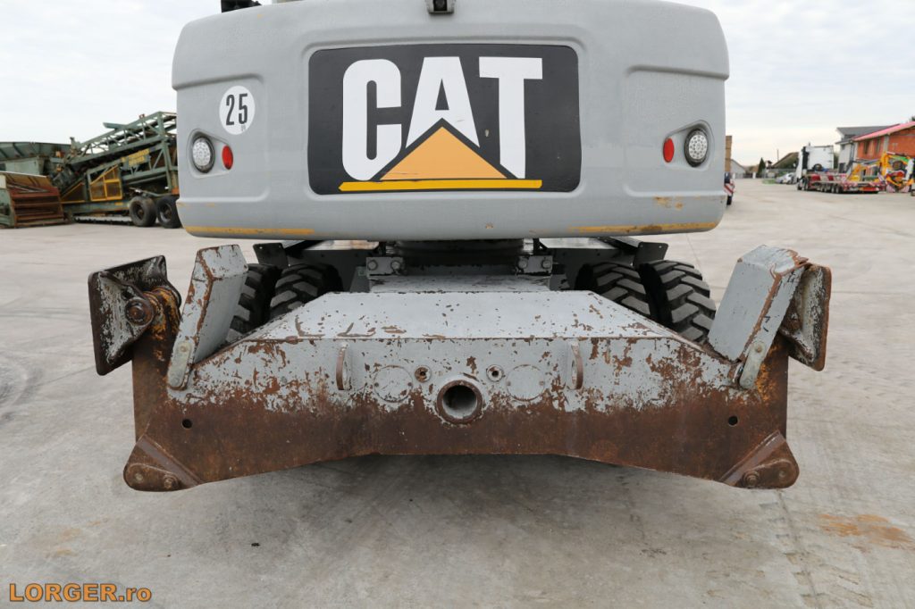 Excavator pe pneuri Caterpillar M313D - 2009