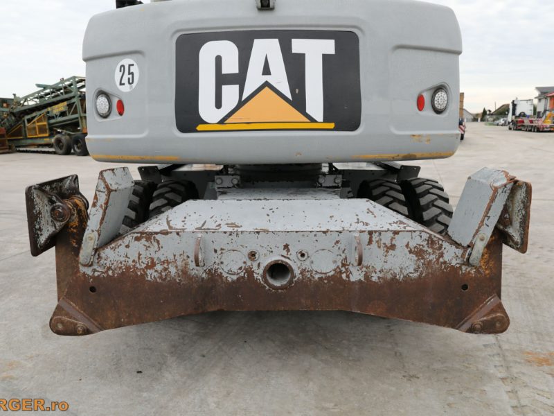 Excavator pe pneuri Caterpillar M313D - 2009