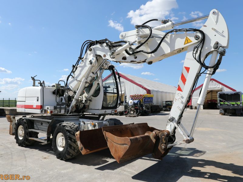 Excavator pe pneuri Liebherr A314 - 2012