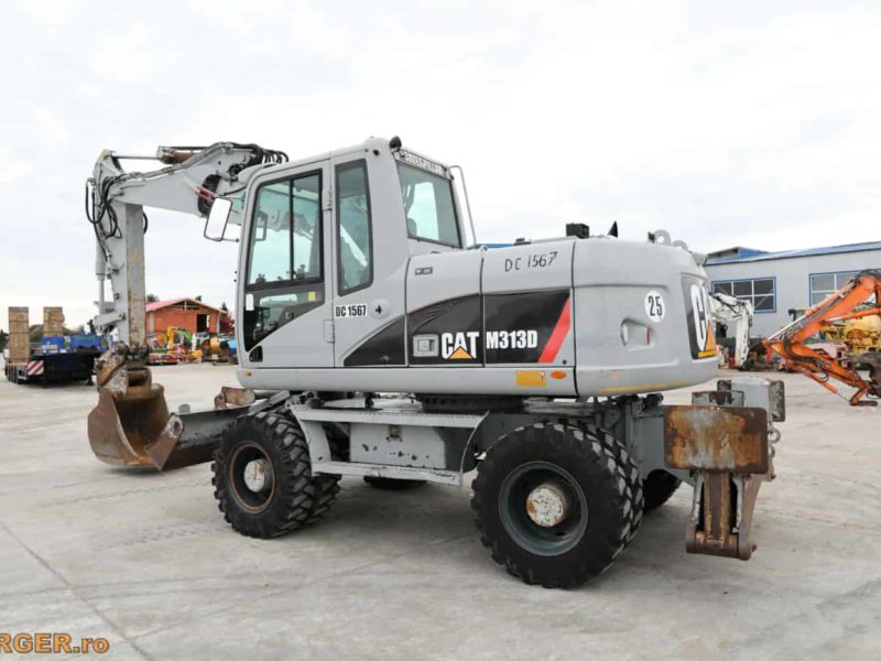 Excavator pe pneuri Caterpillar M313D - 2009