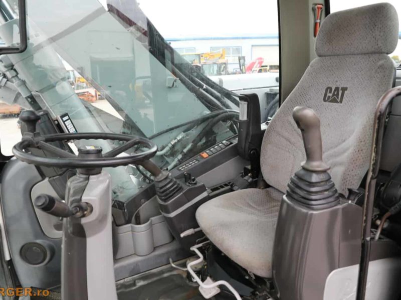 Excavator pe pneuri Caterpillar M313D - 2009