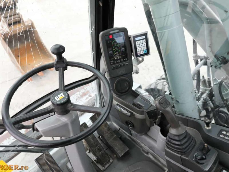 Excavator pe pneuri Caterpillar M313D - 2009